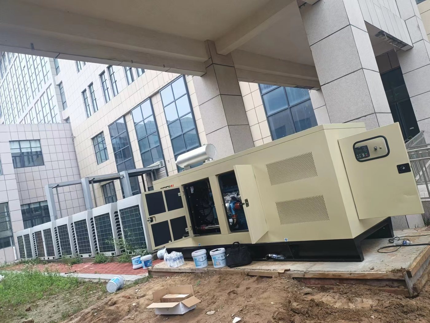Silent generator set installed beside a hospital building