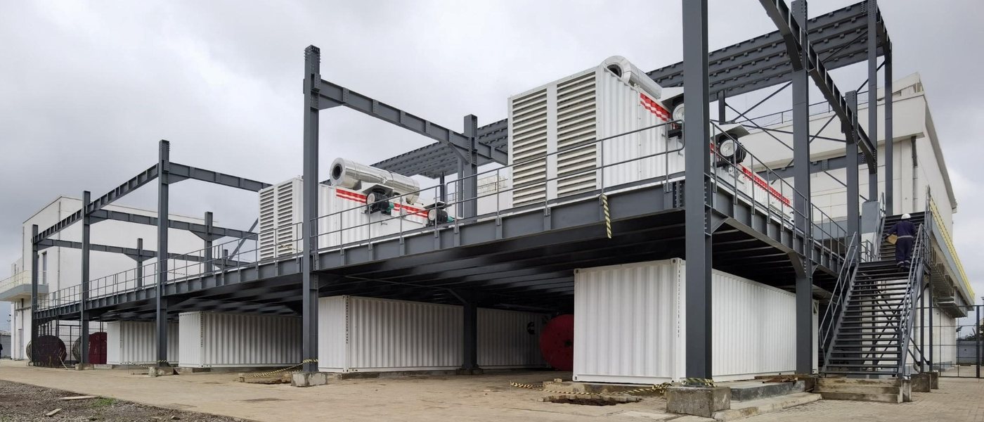 Two-tier steel structure power plant building housing medium-voltage containerised generator sets