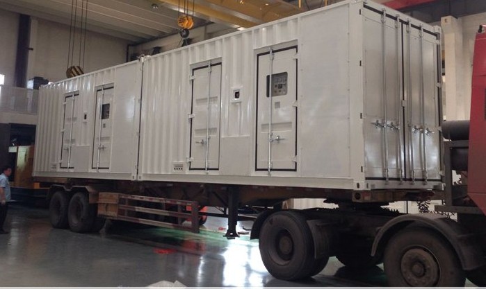 Containerised Cunmi generator sets loaded on a trailer ready for delivery to a construction site project