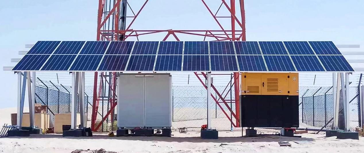 Silent generator set installed at a telecom base station beside a tower and solar array